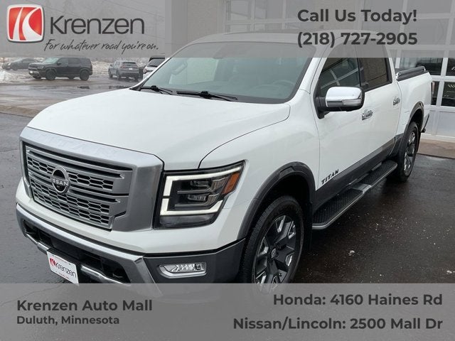 2024 Nissan Titan Platinum Reserve in Pearl White Tricoat — front three-quarter view