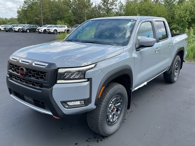2026 Nissan Frontier Crew Cab PRO-4X in Boulder Gray Pearl — front three-quarter view