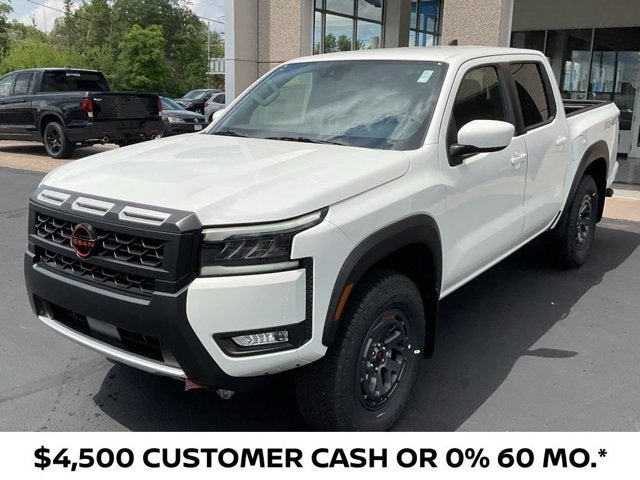 2026 Nissan Frontier Crew Cab PRO-4X in Glacier White — front three-quarter view