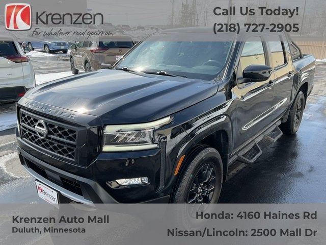 2023 Nissan Frontier SV in Super Black — front three-quarter view