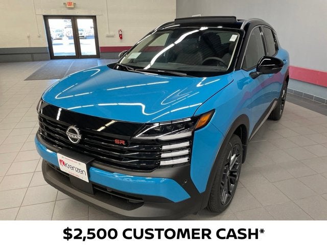 2026 Nissan Kicks SR in Arctic Ice Blue Metallic/Super Black — front three-quarter view