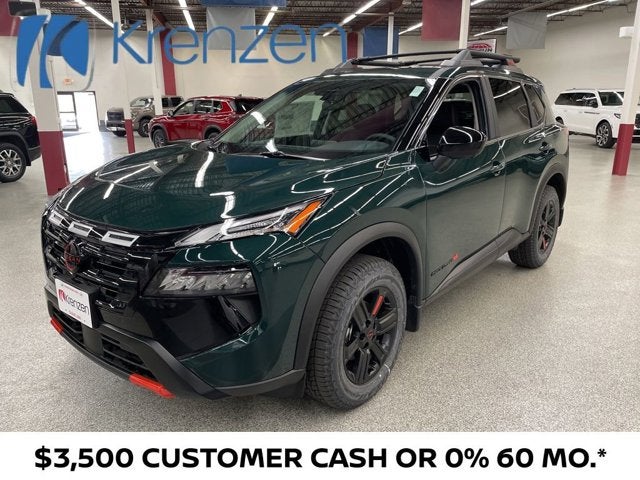 2026 Nissan Rogue Rock Creek in Obsidian Green — front three-quarter view