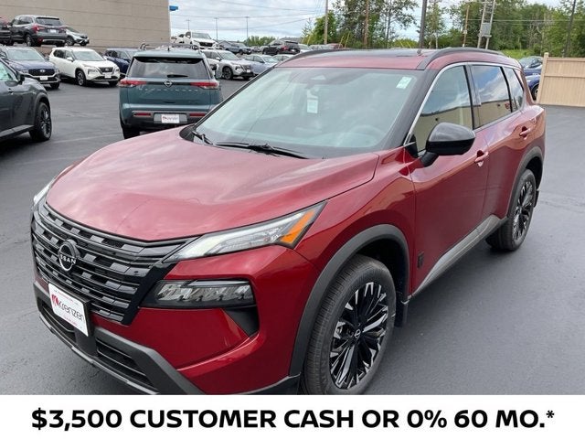 2026 Nissan Rogue Dark Armor in Scarlet Ember Tintcoat — front three-quarter view