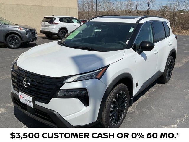 2026 Nissan Rogue Dark Armor in Everest White Pearl Tricoat — front three-quarter view