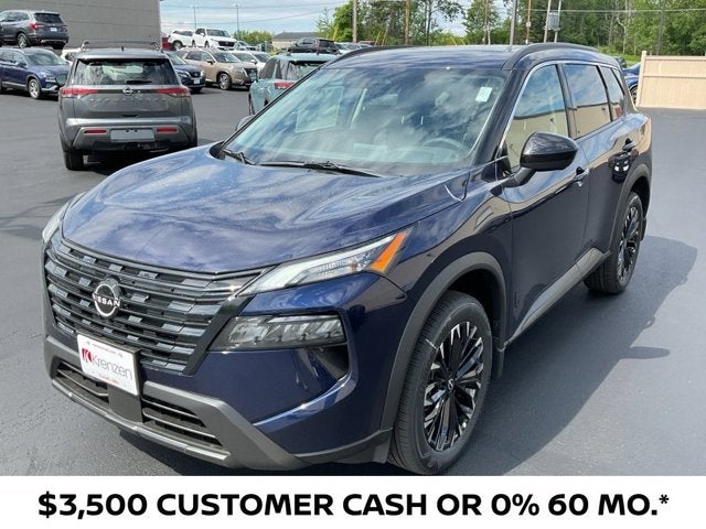 2026 Nissan Rogue Dark Armor in Deep Ocean Blue Pearl — front three-quarter view